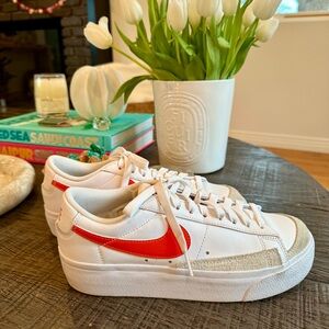 Nike blazer low platform sneaker in orange